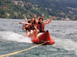 Bananaboat fahren beim Sporthotel ROYAL X – Urlaub in der Pension Elisabeth – Frühstückspension am Millstätter See – Urlaub in Kärnten